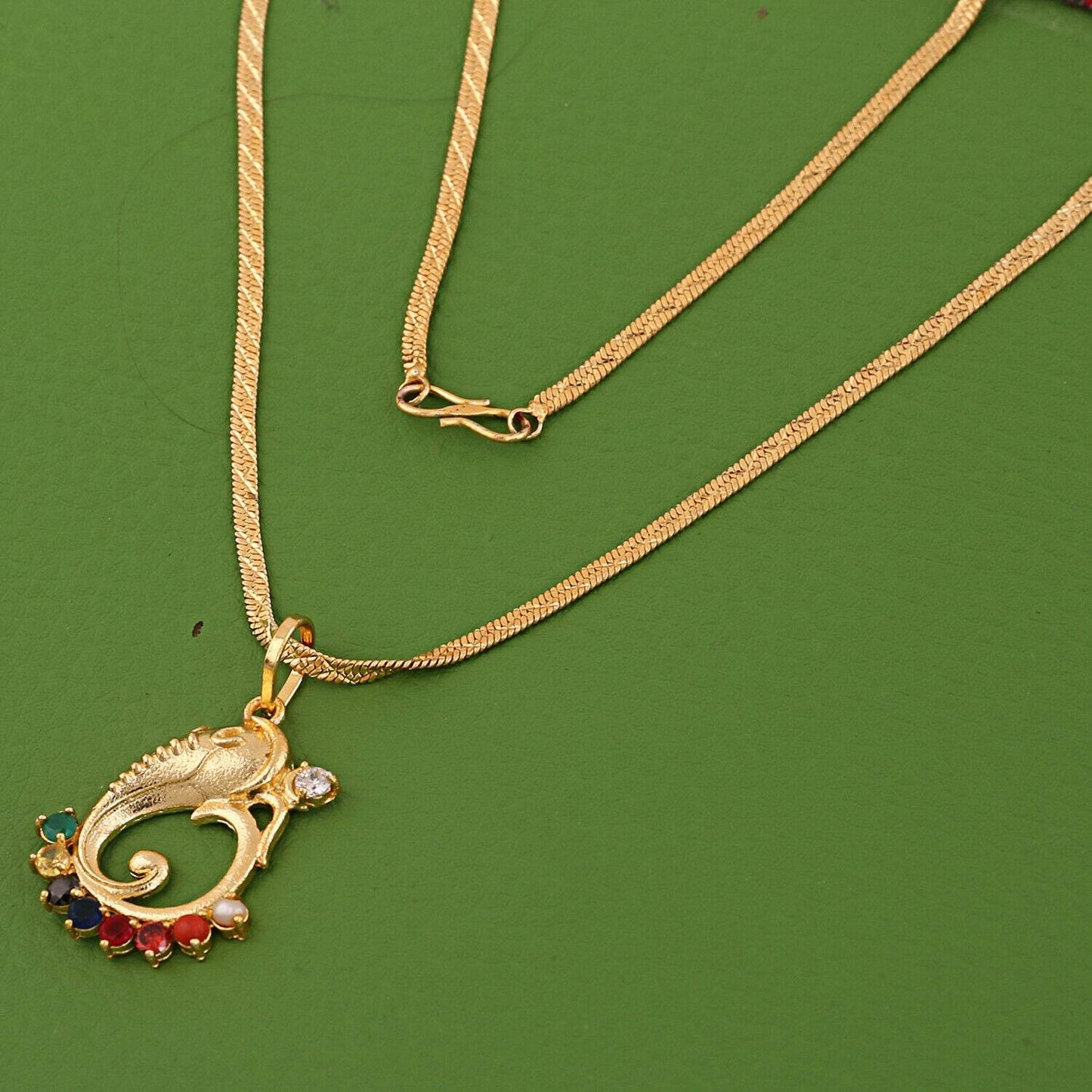 Swastik Ganesha Navratna Pendant – Gold Rhodium Plated Brass (Panchdhatu) | 9 Synthetic Gems | Real Pearl | Spiritual Energy - Aemorio